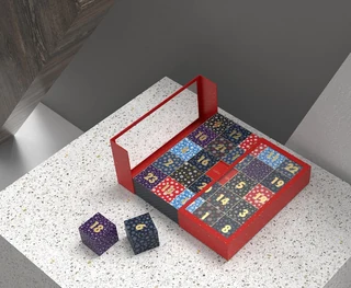Open red calendar box with individually fitted numbered compartments