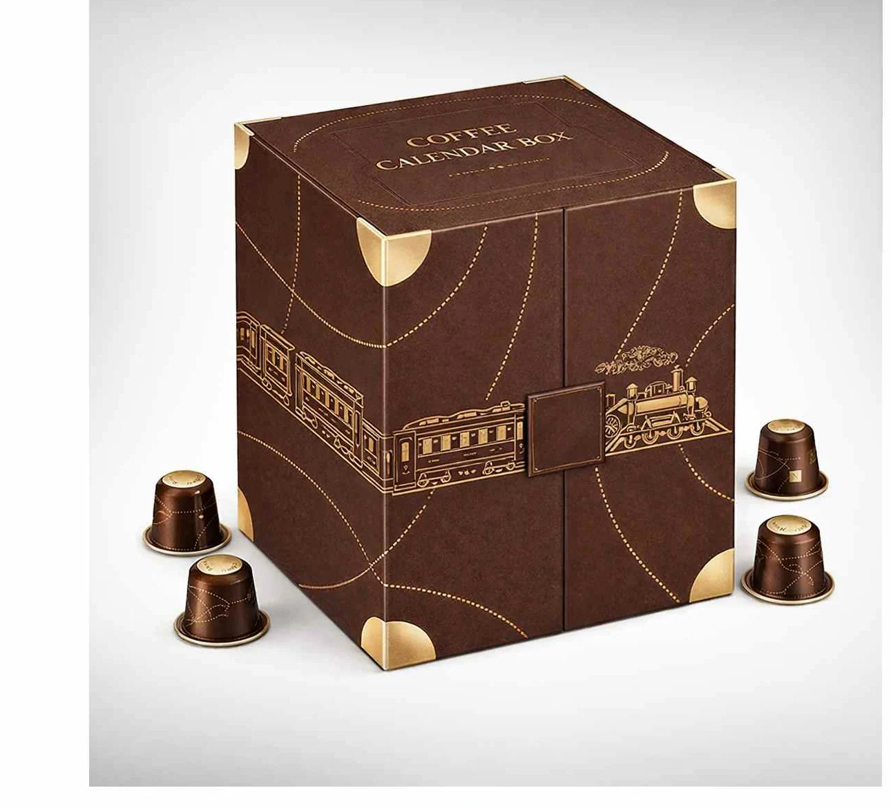 Closed brown and gold coffee advent calendar box with train artwork